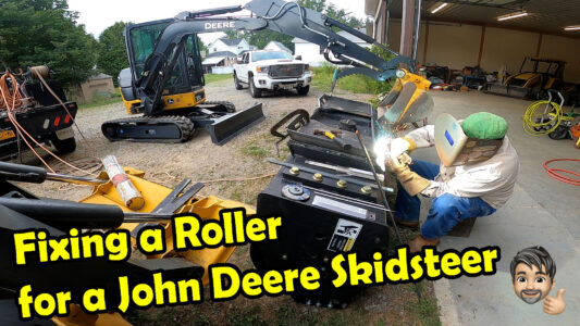 Fixing a roller for a john deere 323E skidsteer